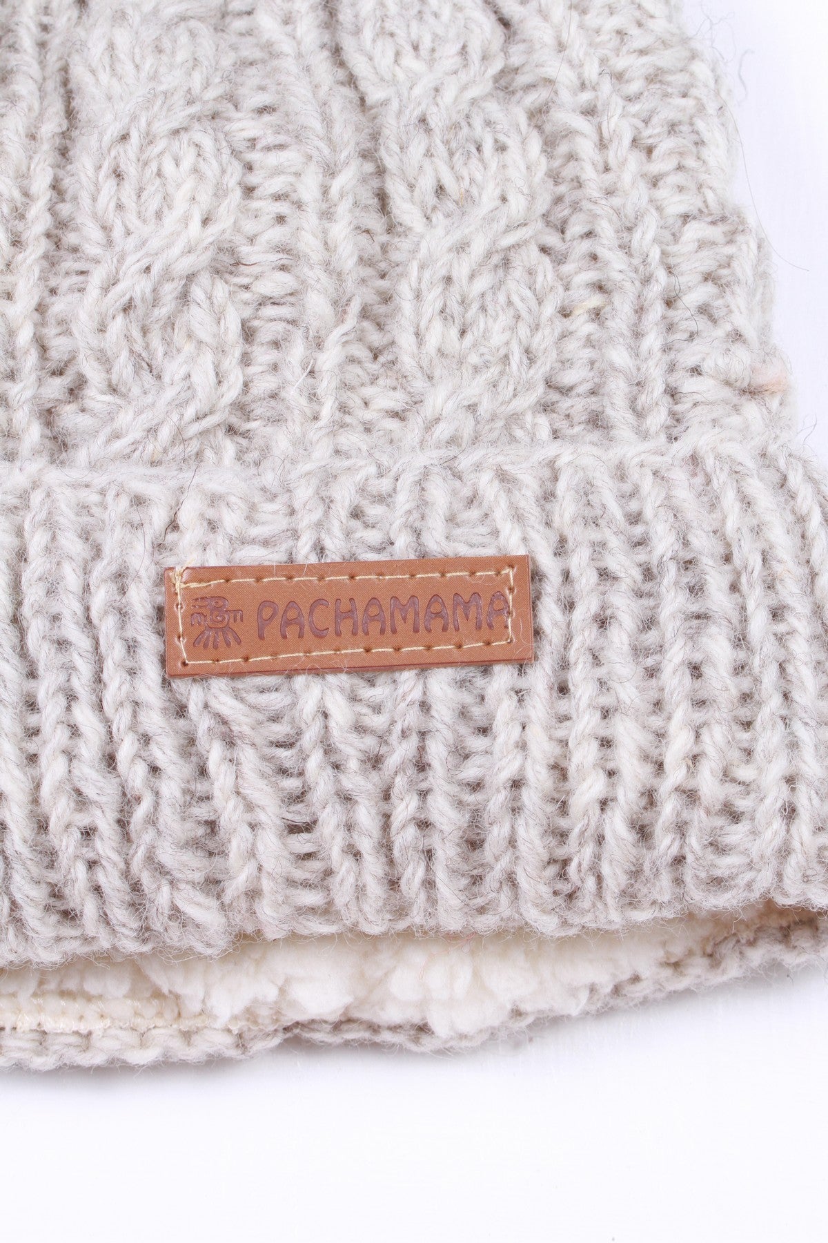 Pachamama Chamonix Bobble Beanie, Hand Knitted Cable, Sherpa Fleece Lined, Wool, Oatmeal