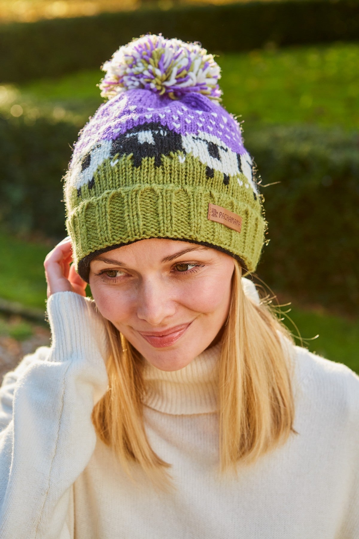 Pachamama Black Sheep Roll Back Bobble Beanie, Hand Knitted, Lined, Wool, Purple