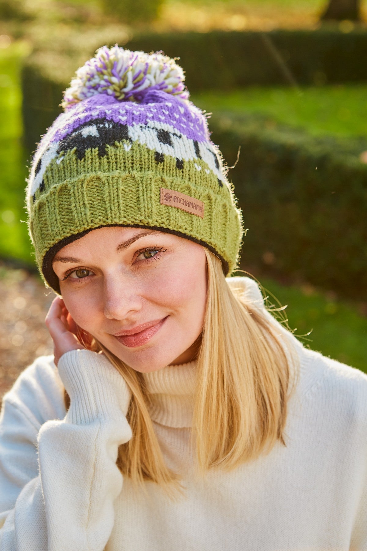 Pachamama Black Sheep Roll Back Bobble Beanie, Hand Knitted, Lined, Wool, Purple